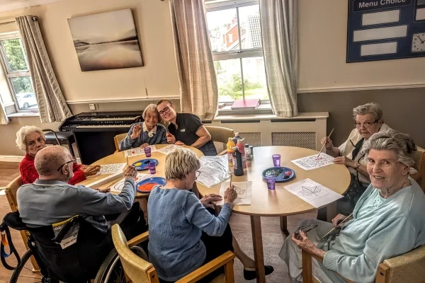 Residents enjoying a table activity together at Wainfleet